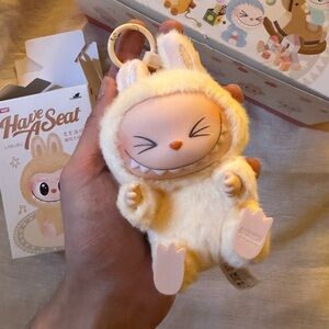 Popmart The Monsters Labubu Have A Seat- Single SISI